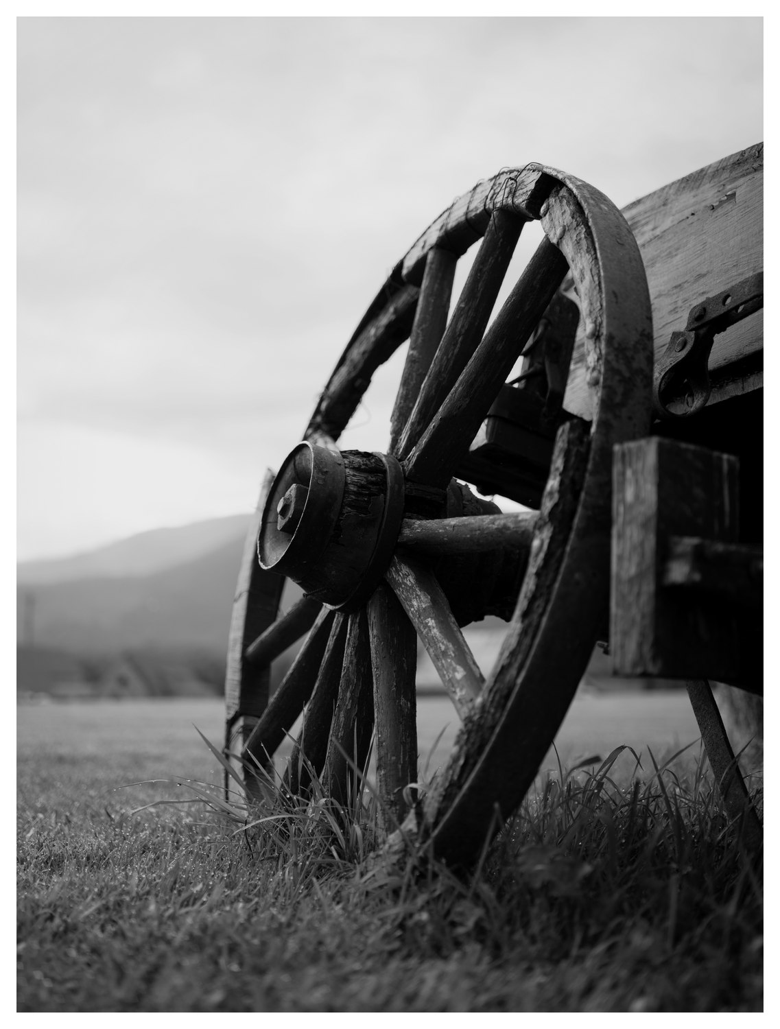 Black-and-white wagon wheel photograph