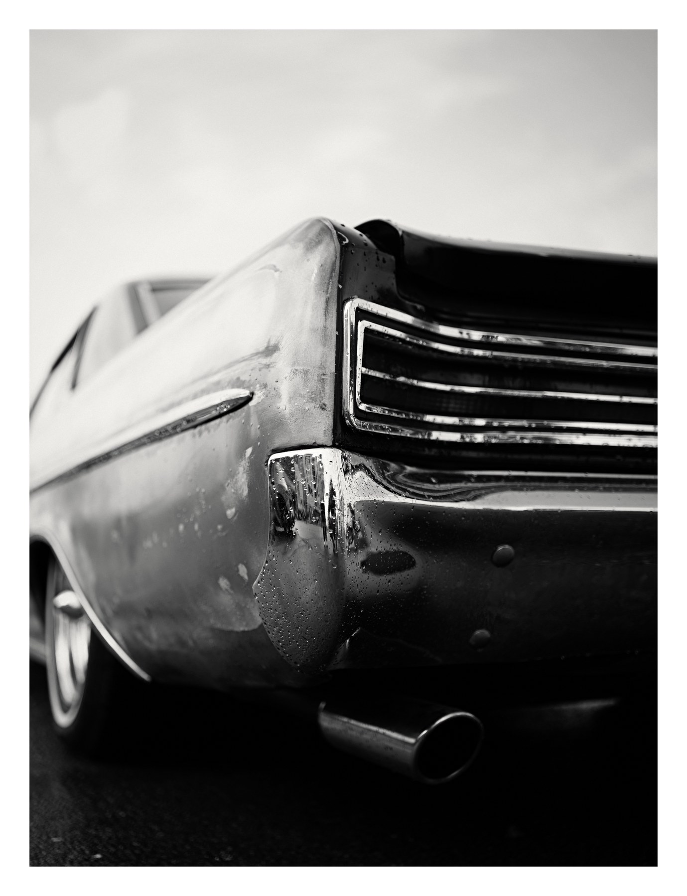 Black-and-white classic car detail